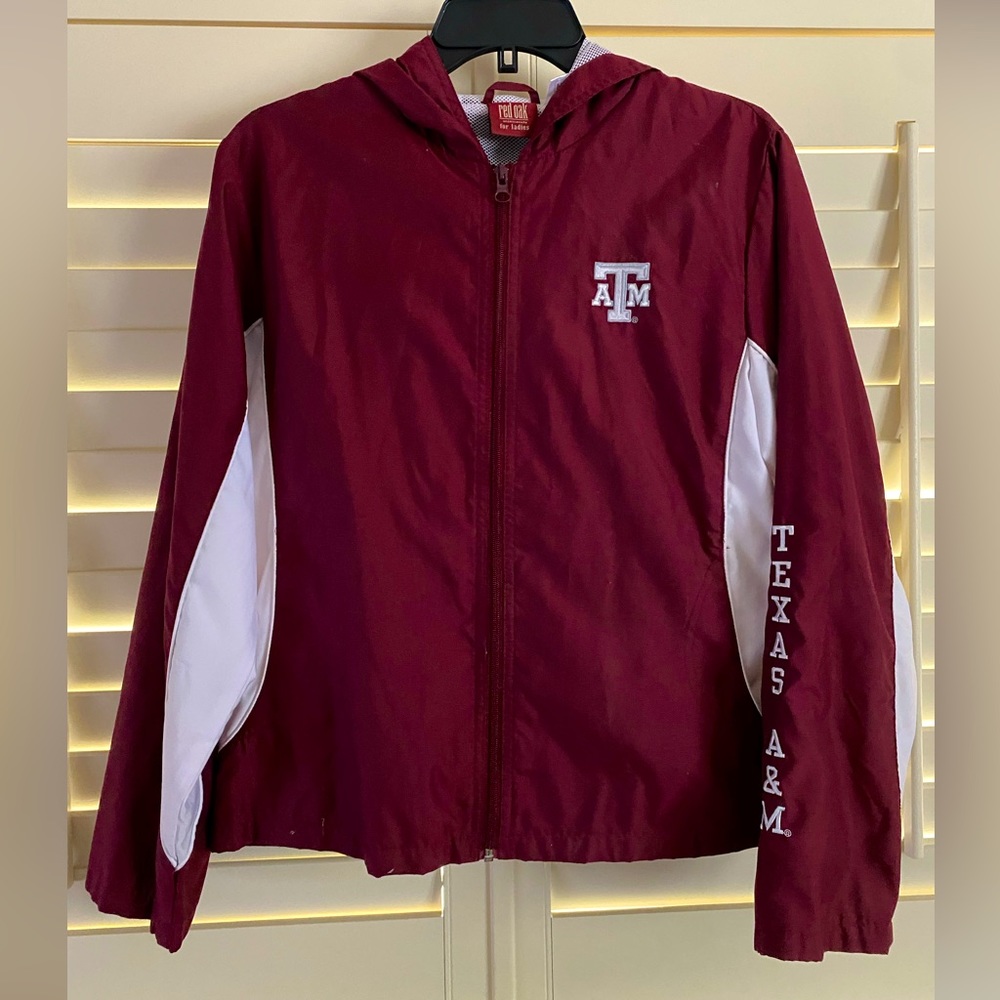 Womenswear Texas A&M water resistant windbreaker hoodie.